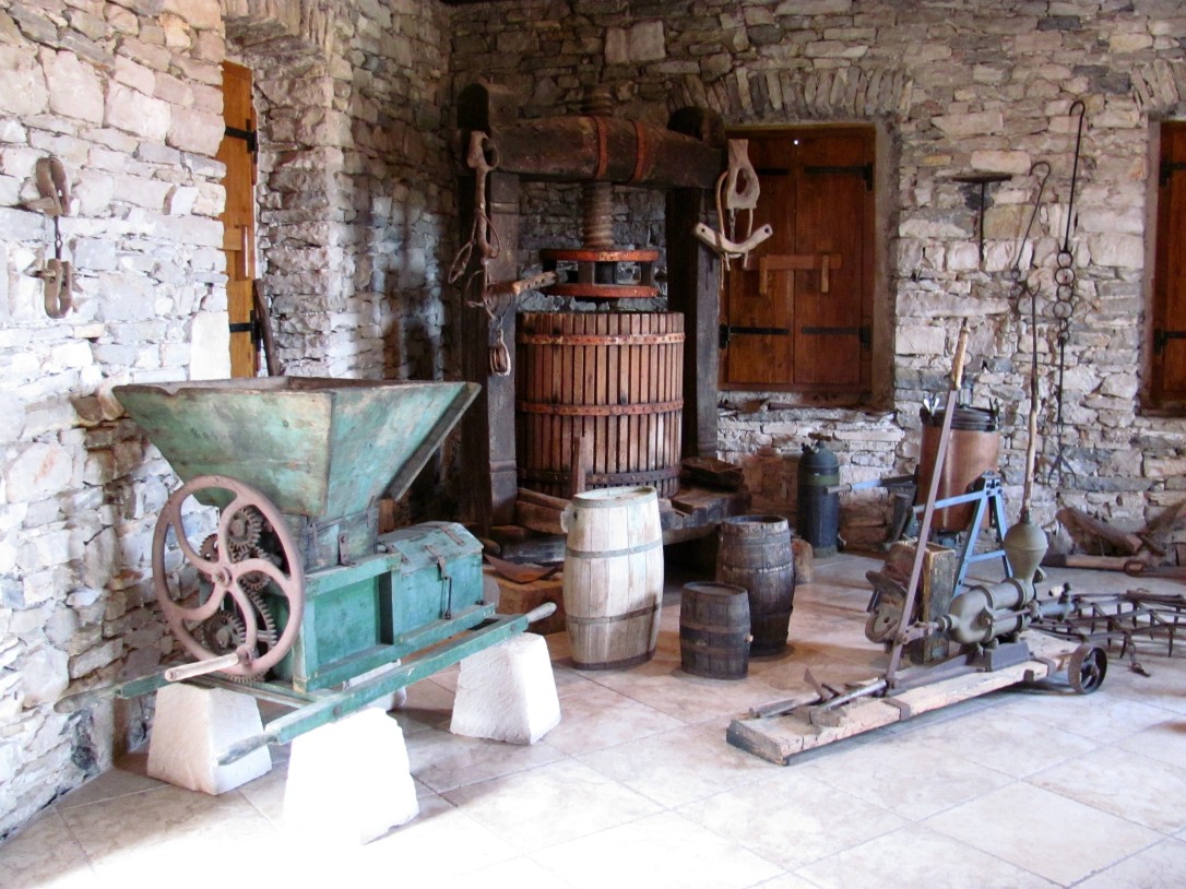 Traditional wine making tools inside the Toreta Winery